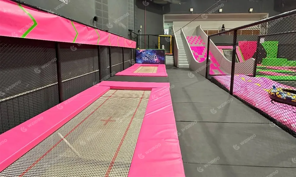 Separated professional trampoline zone for high-performance jumping.