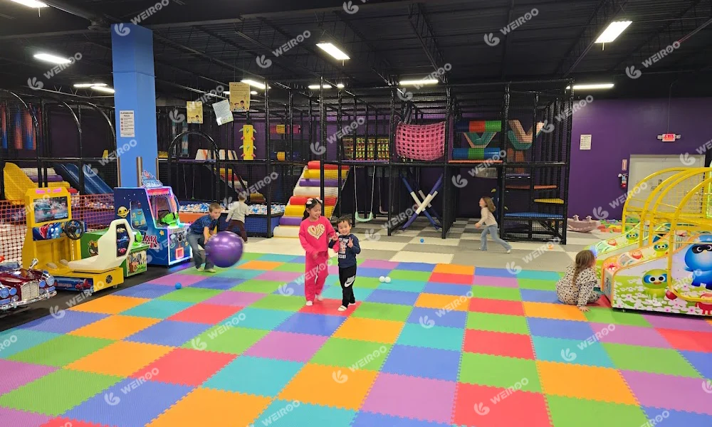 Bright and vibrant commercial indoor playground equipment installed in Martinsburg, WV.