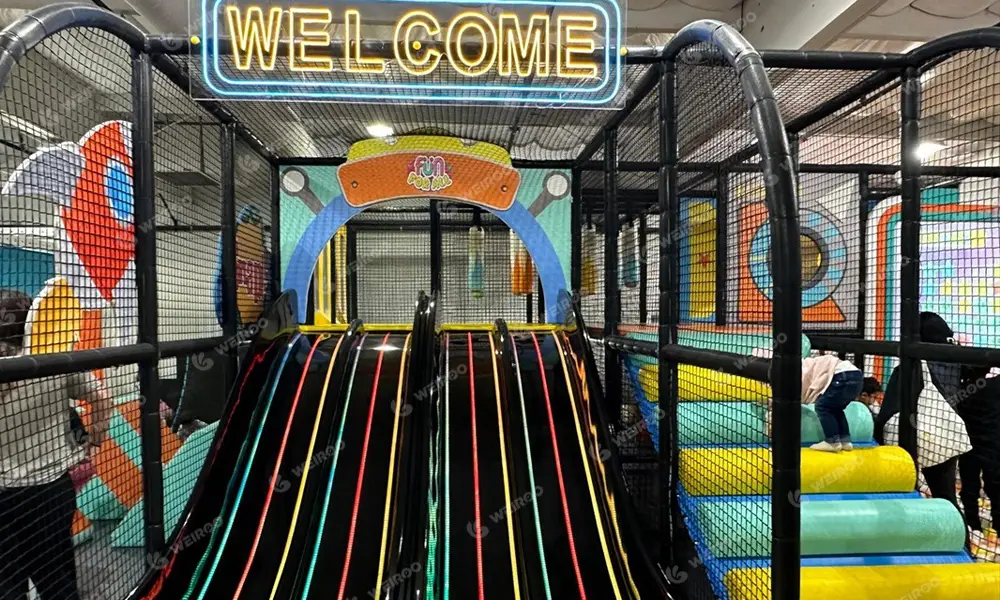 Triple lane LED light slide with candy colors at Fun for All Huntington Beach.