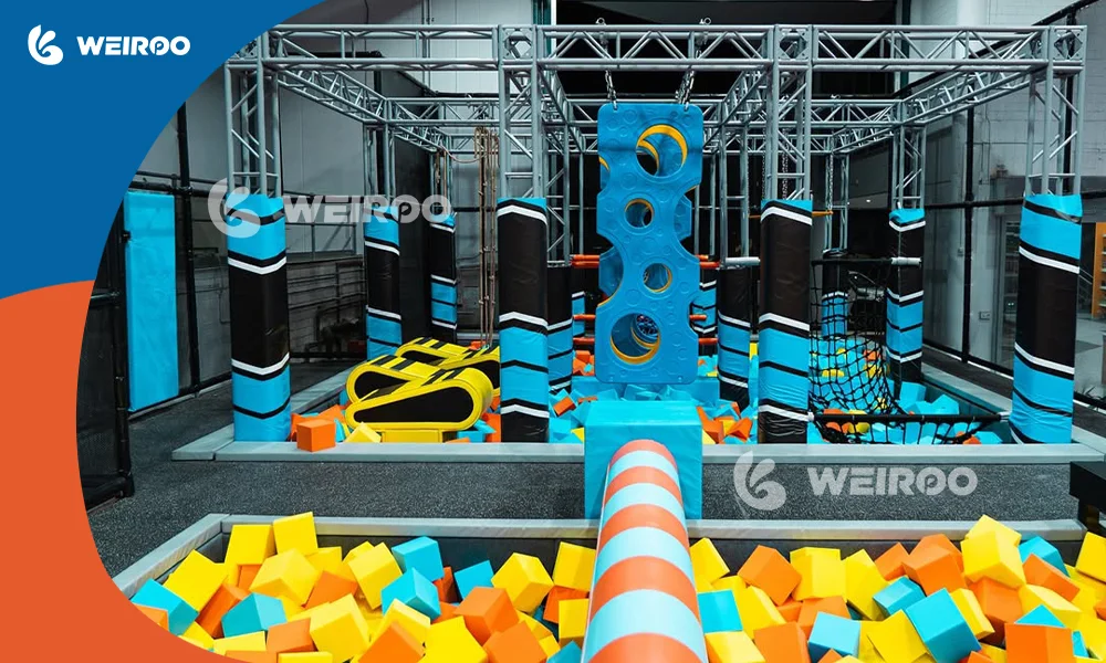 Custom ninja warrior obstacle course with foam pit for indoor trampoline parks.