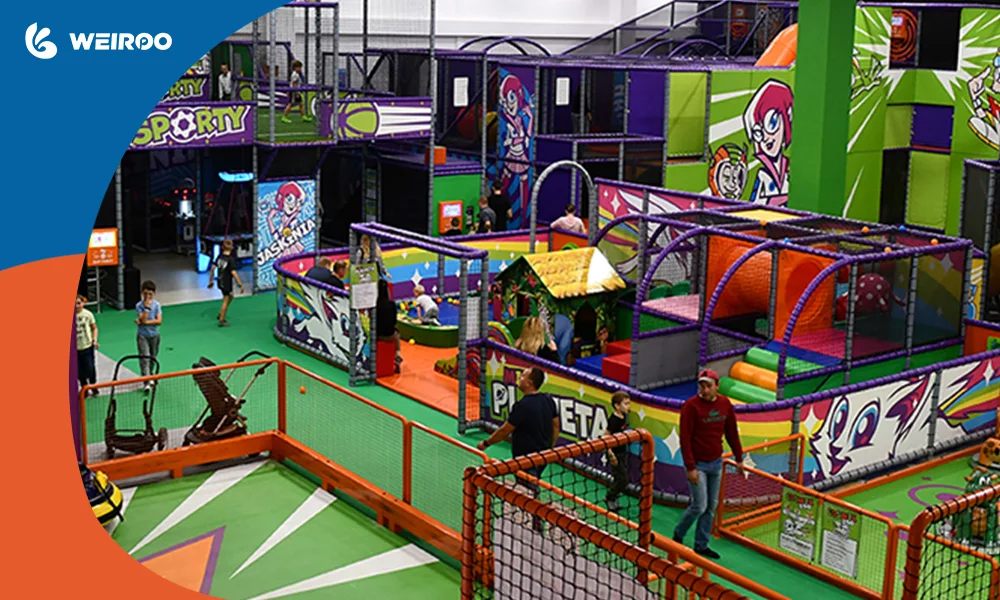 A vibrant, fully operational commercial indoor playground filled with customers, representing the successful grand opening after following a realistic timeline.