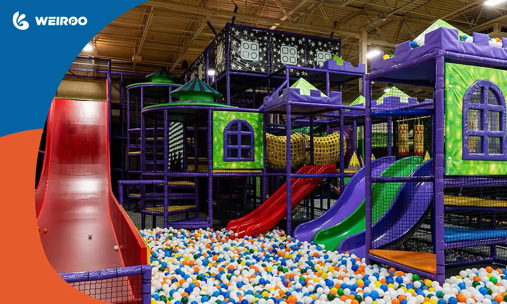 A massive red Devil Slide and multi-level play structure acting as anchor attractions, a key equipment strategy for a highly profitable indoor playground business.