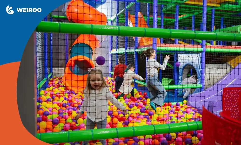 A dedicated toddler soft play zone and ball pit inside a trampoline park, manufactured by a top kids indoor playground in China.