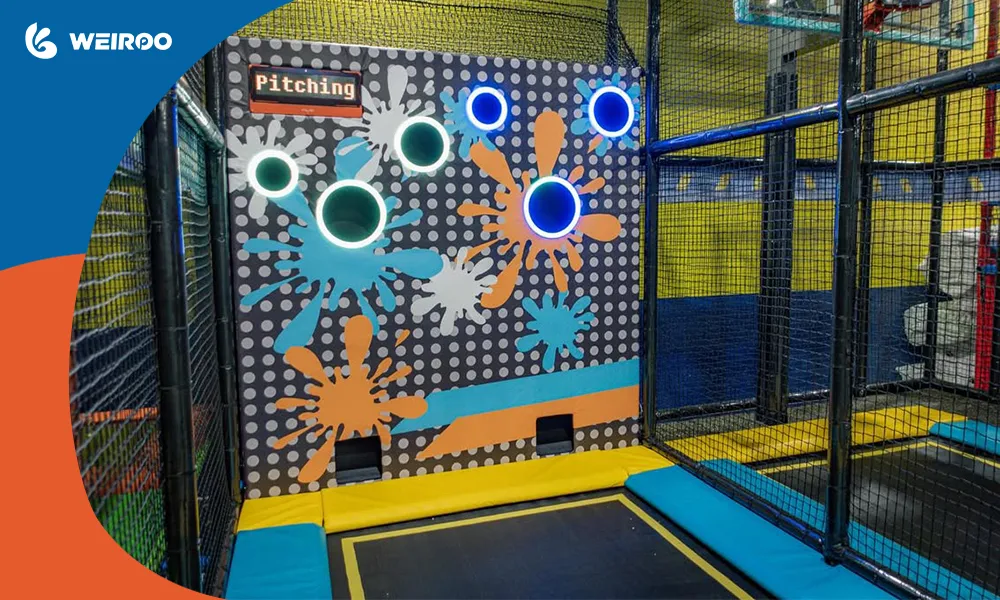 An interactive digital target wall game integrated with trampolines, showing innovative equipment options for your own brand or franchise.
